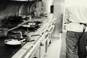 a chef cooking in a kitchen